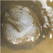 The thick cap of water ice at Mars' north pole is more than 1000 kilometres wide and up to three kilometres deep.